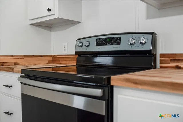 a view of porch with wooden floor