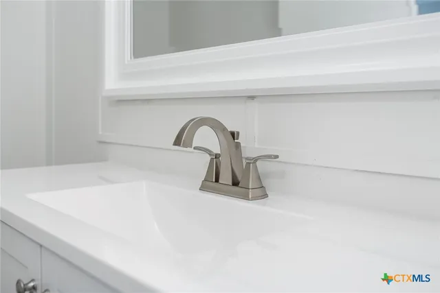 an aerial view of a house with a ocean view