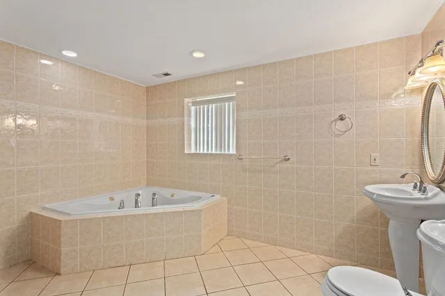 a view of storage and utility room with washer and dryer