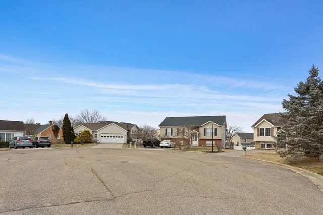 front view of a house with a street view