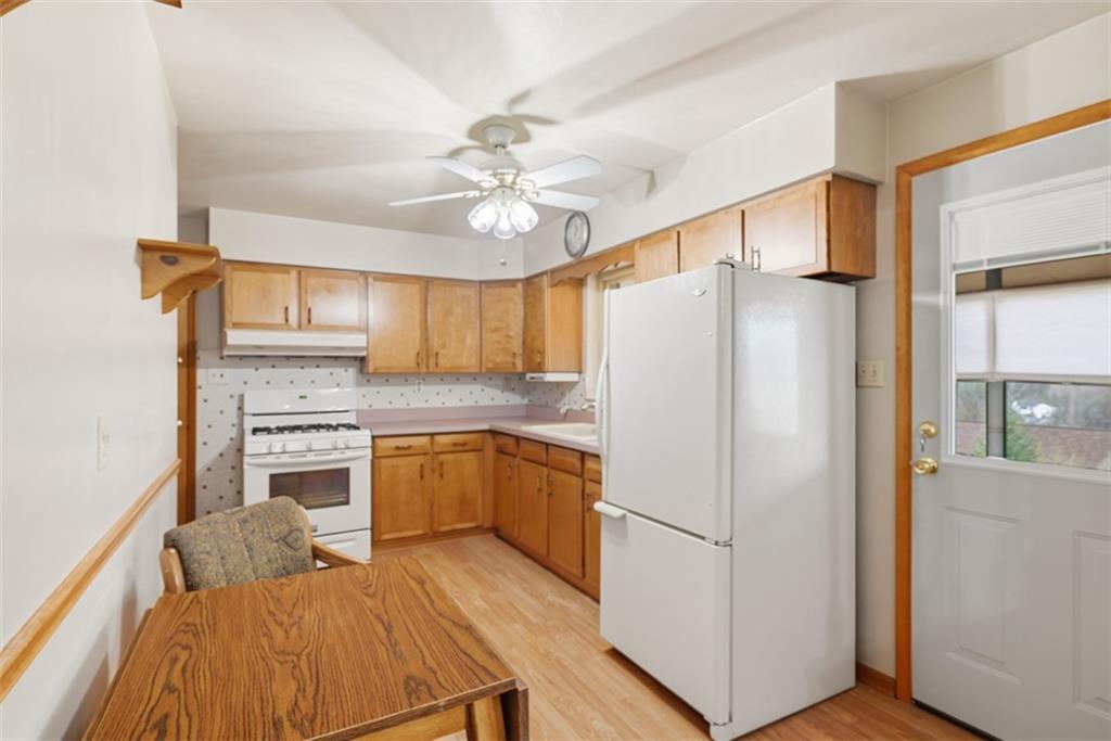 42 Lee Avenue Washington, PA 15301 - Photo 13 of 48 a kitchen with a refrigerator a sink and dishwasher