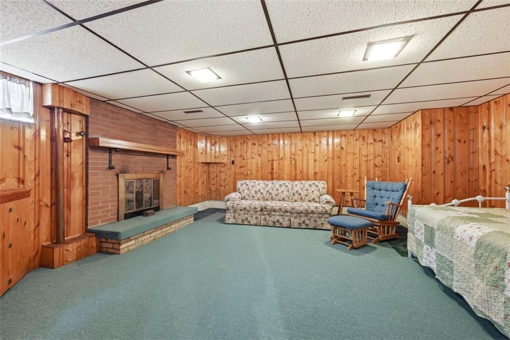 42 Lee Avenue Washington, PA 15301 - Photo 28 of 48 a room with a bed and a couch