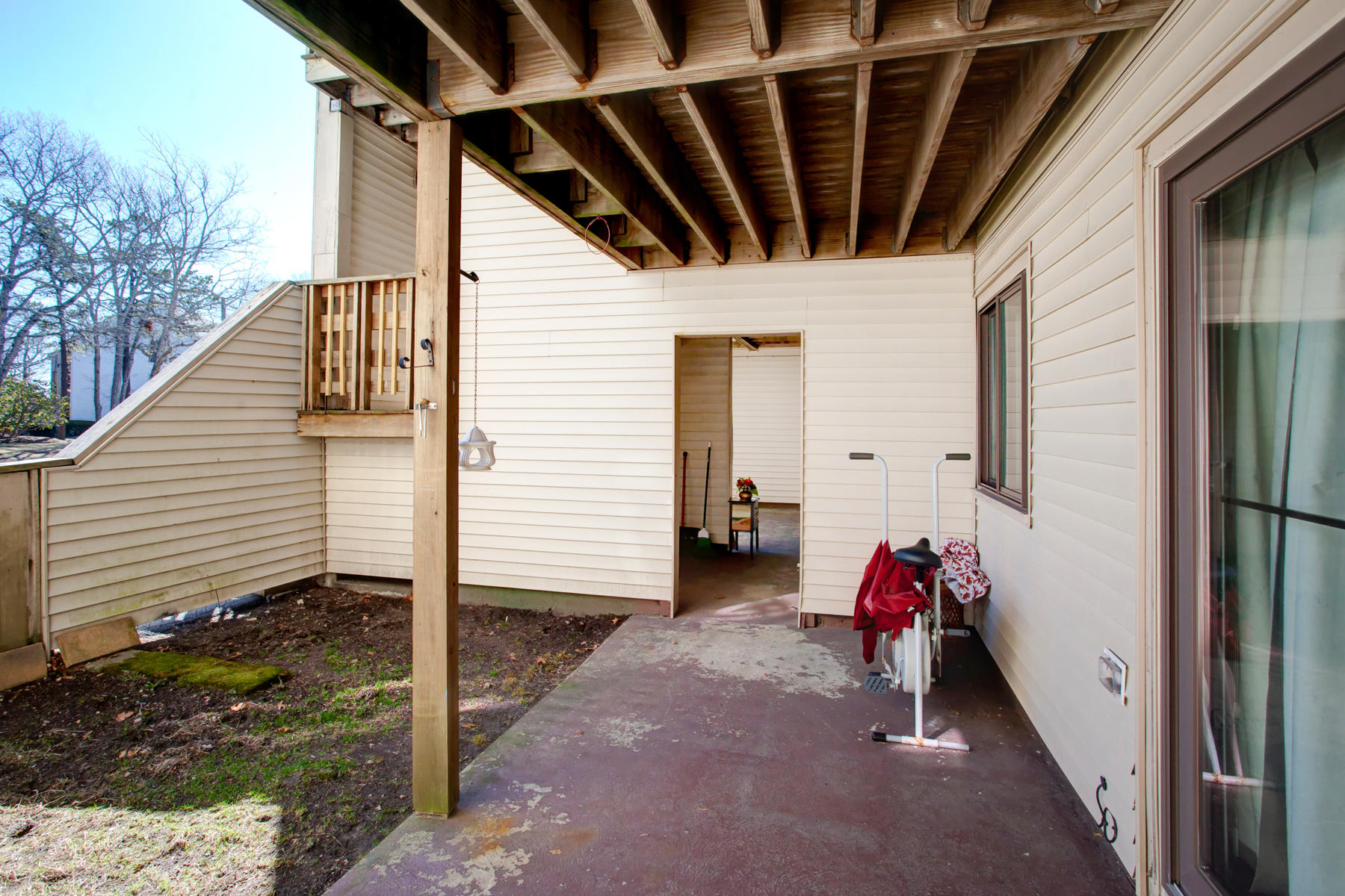 800 Bearses Way, Unit 4EF Hyannis, MA 02601 - Photo 18 of 22 a view of a porch with hardwood