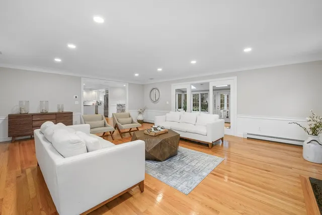 a living room with furniture and a table