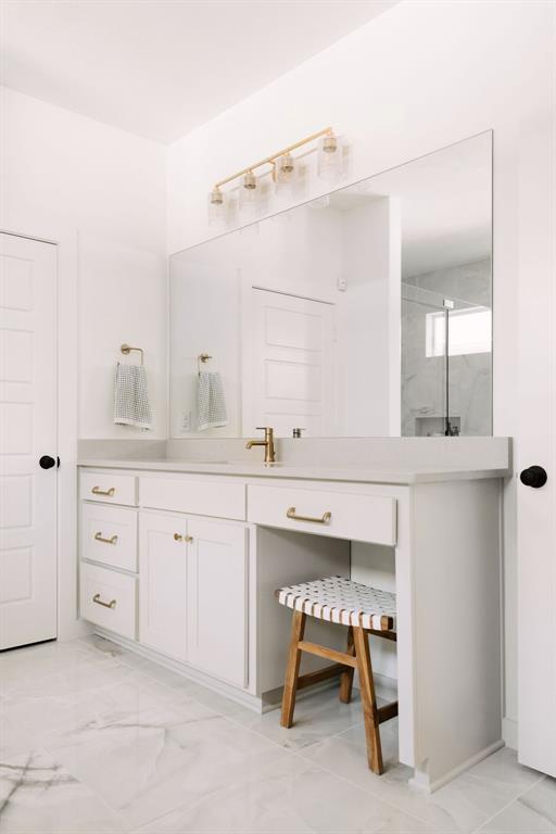 841 Meadowbend Loop South Grapevine, TX 76051 - Photo 14 of 20 a spacious bathroom with a sink double vanity and mirror