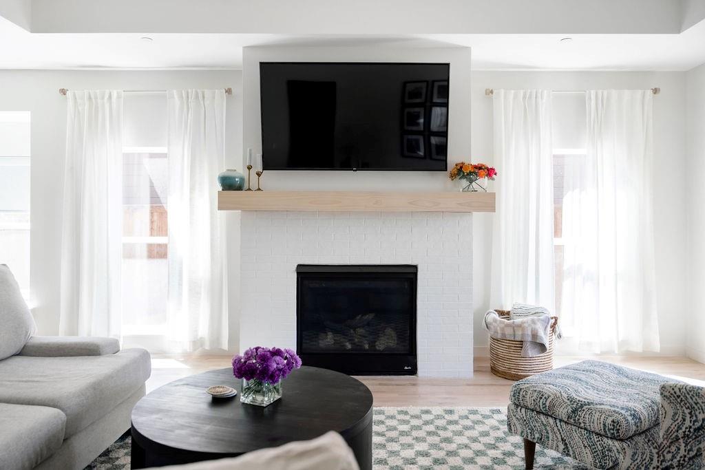 841 Meadowbend Loop South Grapevine, TX 76051 - Photo 5 of 20 a bedroom with a bed and a fireplace