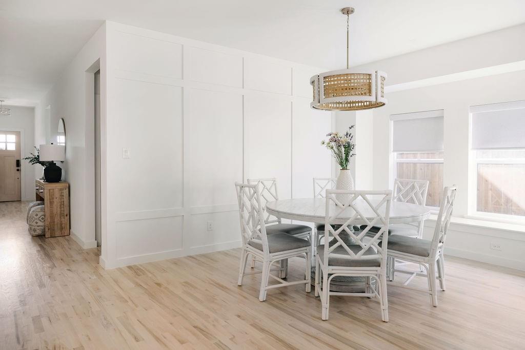 841 Meadowbend Loop South Grapevine, TX 76051 - Photo 7 of 20 a view of a dining room with furniture and wooden floor
