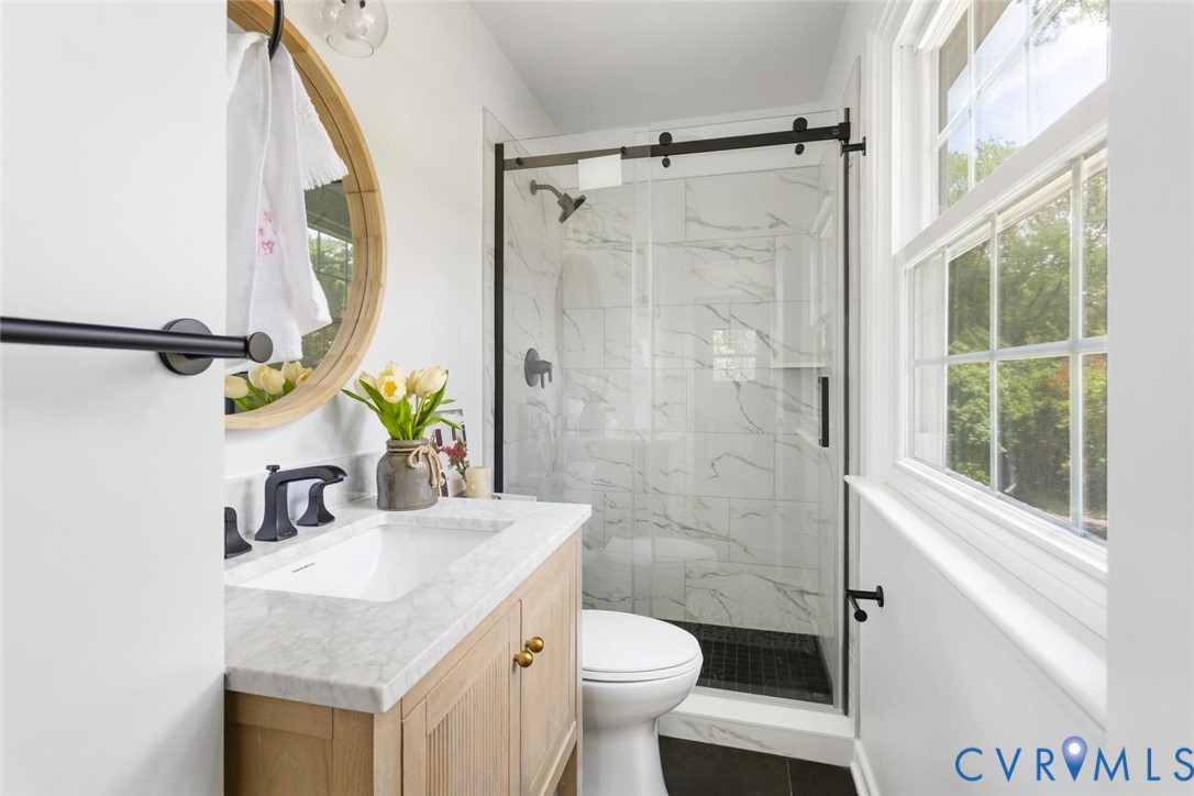 10260 Maplested Lane Henrico, VA 23229 - Photo 21 of 38 Bathroom featuring a light wood-finish vanity with