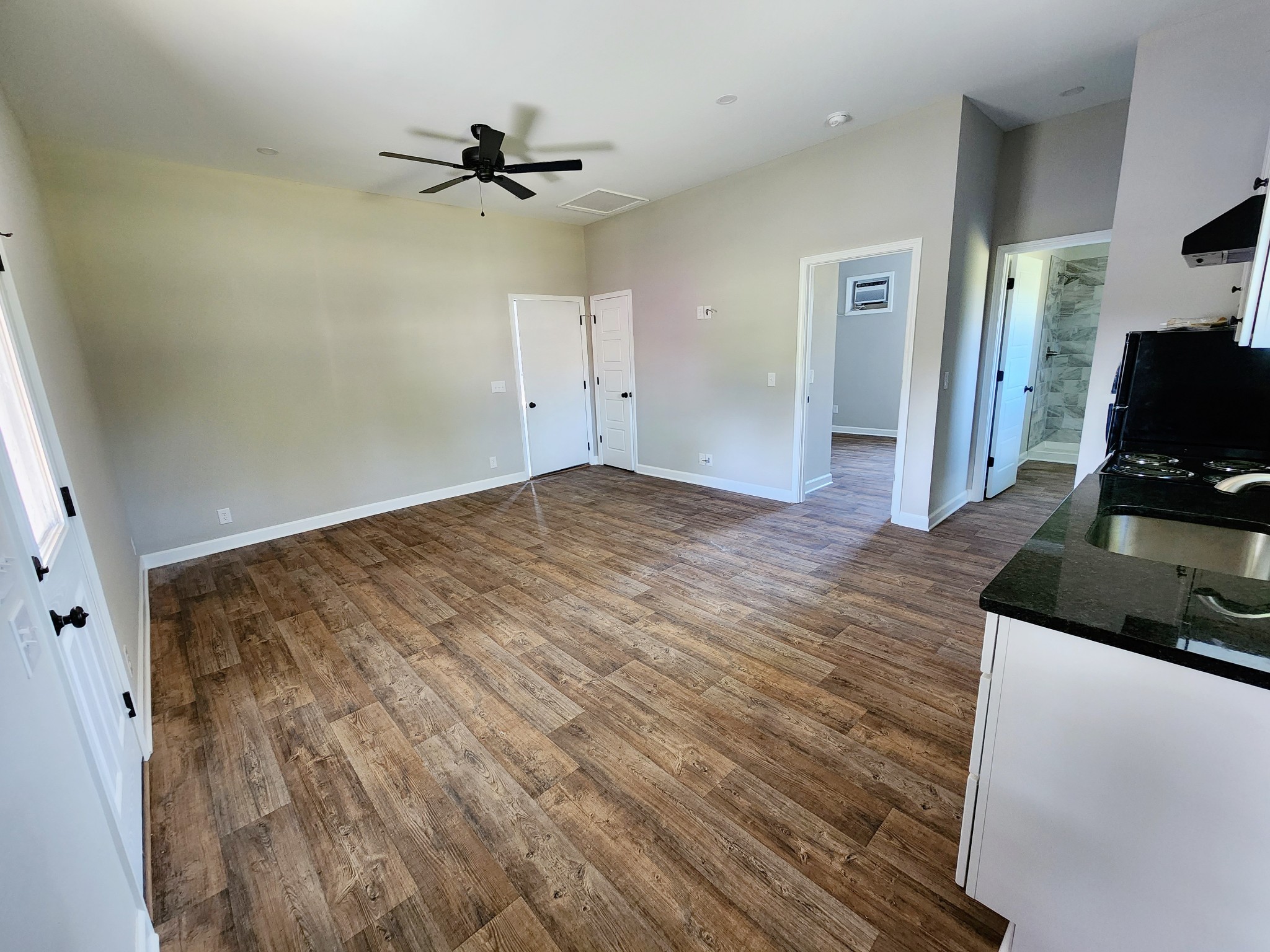 0 Kaiser Road Dickson, TN 37055 - Photo 5 of 14 a view of a livingroom with a flat screen tv and ceiling fan