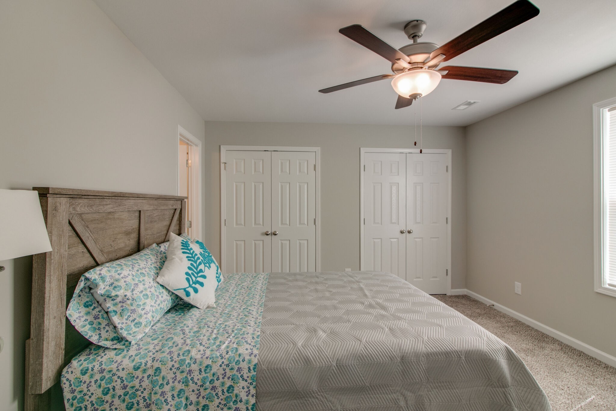 947 Center Road, Unit B Clarksville, TN 37042 - Photo 13 of 24 a bedroom with a bed and a chandelier