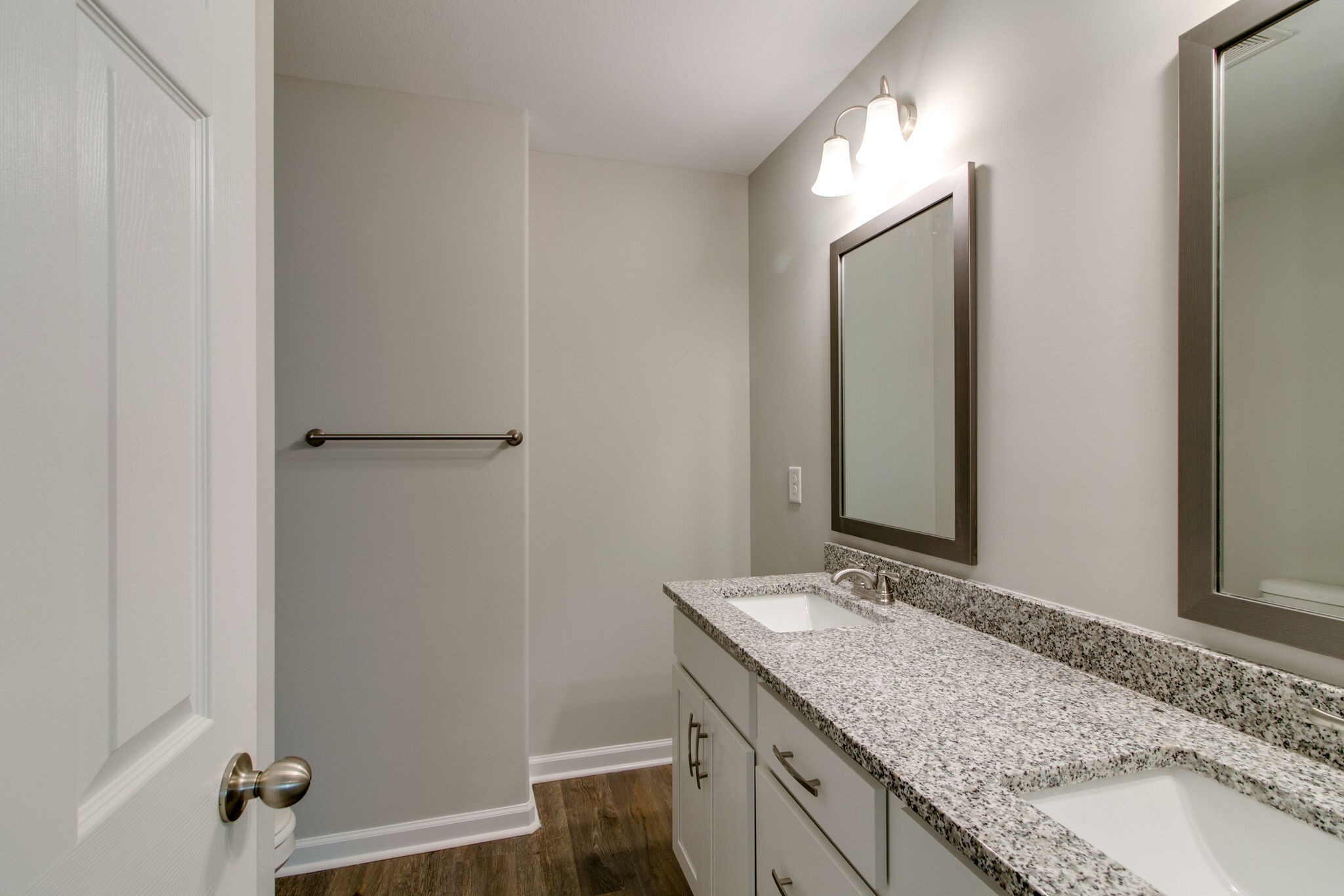 947 Center Road, Unit B Clarksville, TN 37042 - Photo 14 of 24 a bathroom with a granite countertop sink and a mirror
