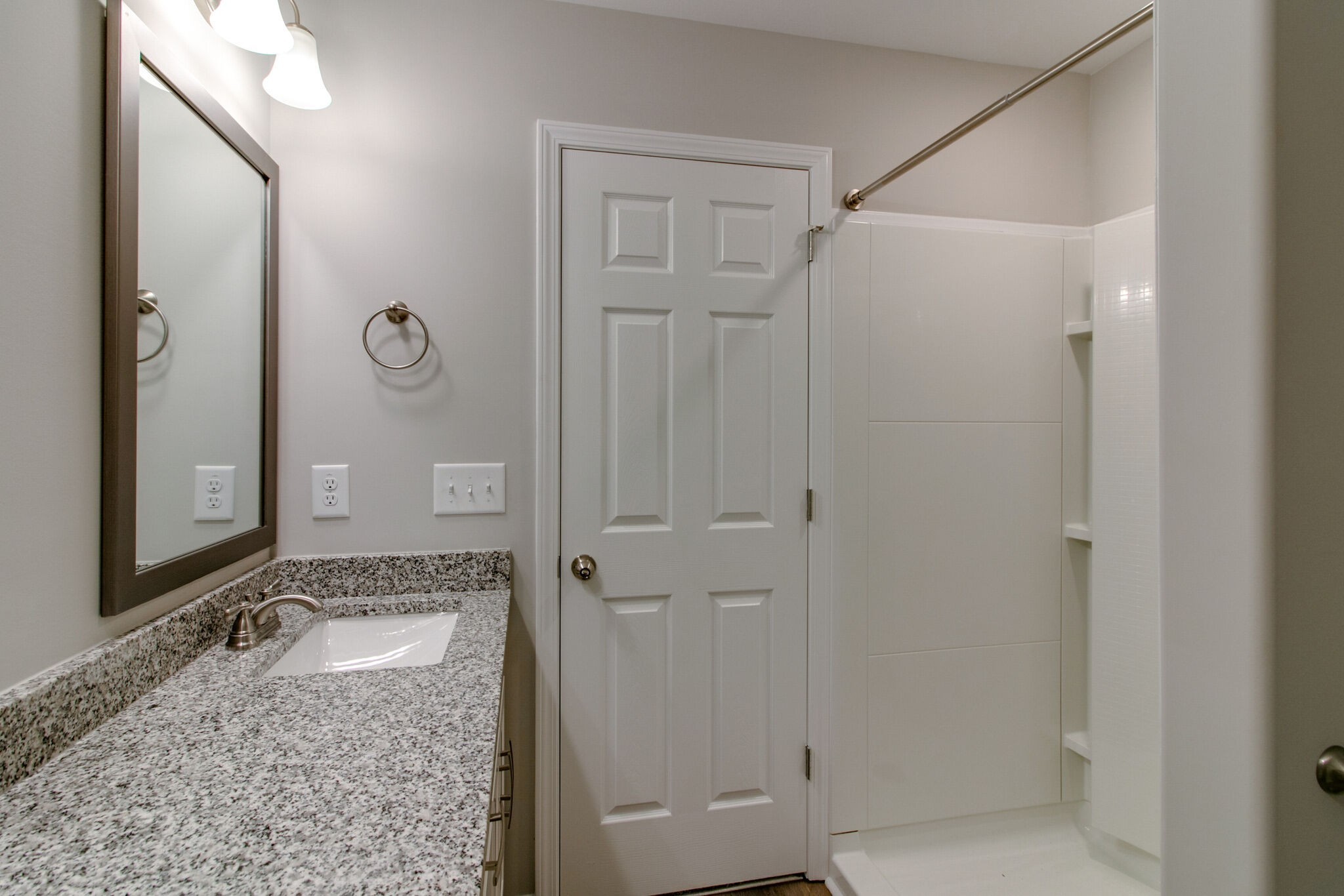 947 Center Road, Unit B Clarksville, TN 37042 - Photo 15 of 24 a bathroom with a granite countertop sink a mirror and shower