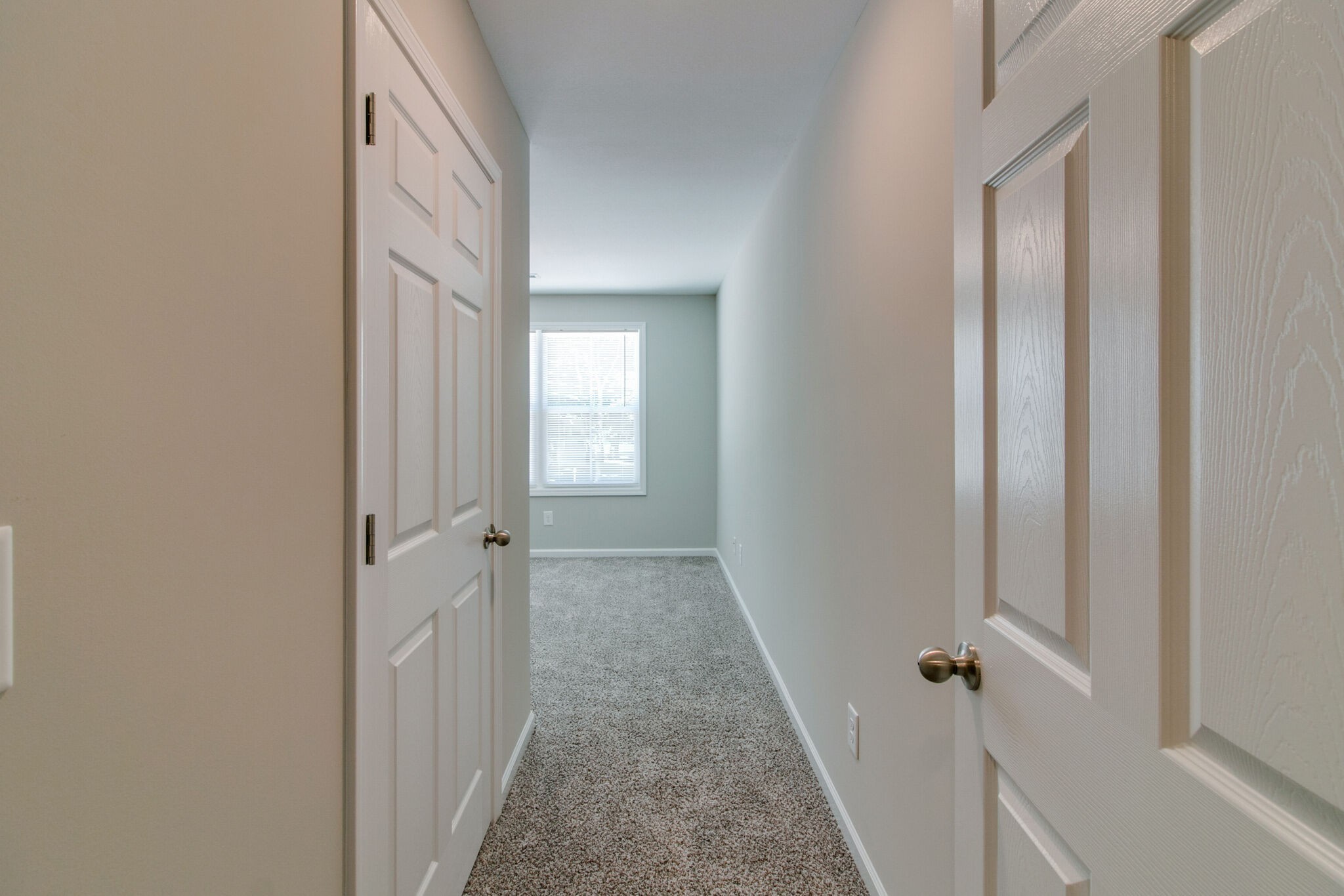 947 Center Road, Unit B Clarksville, TN 37042 - Photo 19 of 24 a view of a hallway with a white walls