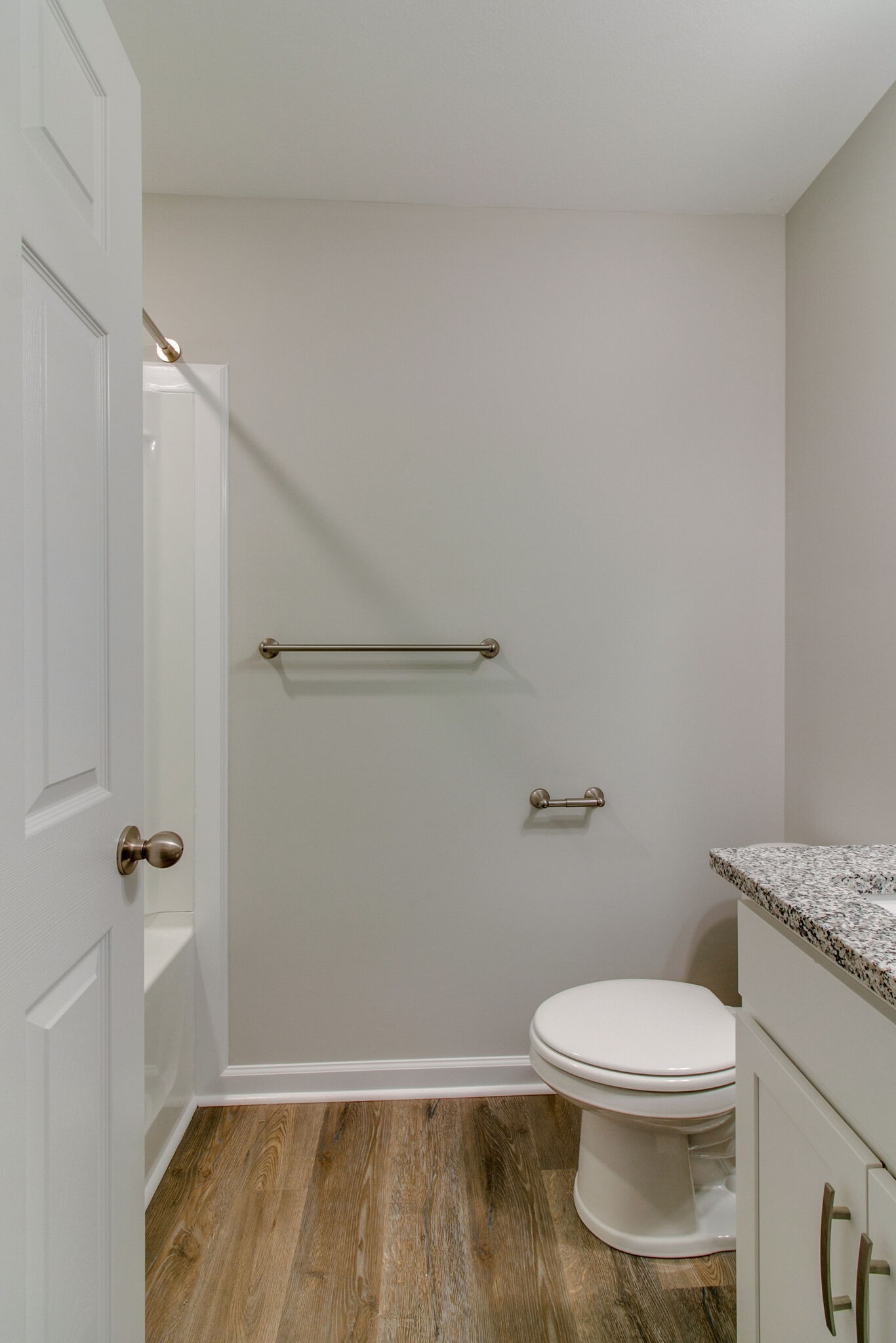 947 Center Road, Unit B Clarksville, TN 37042 - Photo 23 of 24 a white toilet sitting next to a bathroom sink