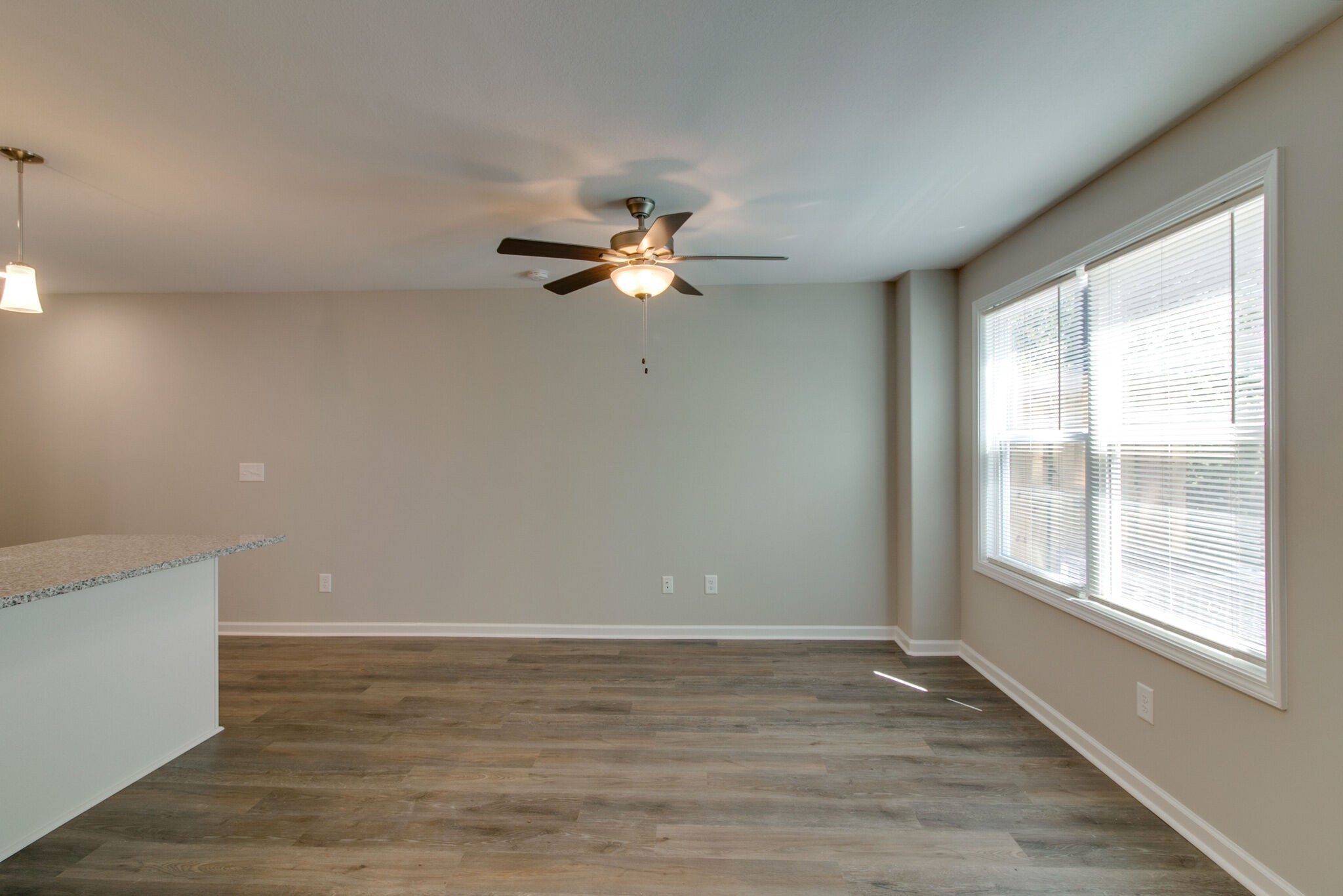 947 Center Road, Unit B Clarksville, TN 37042 - Photo 5 of 24 a view of an empty room with a window and a ceiling fan