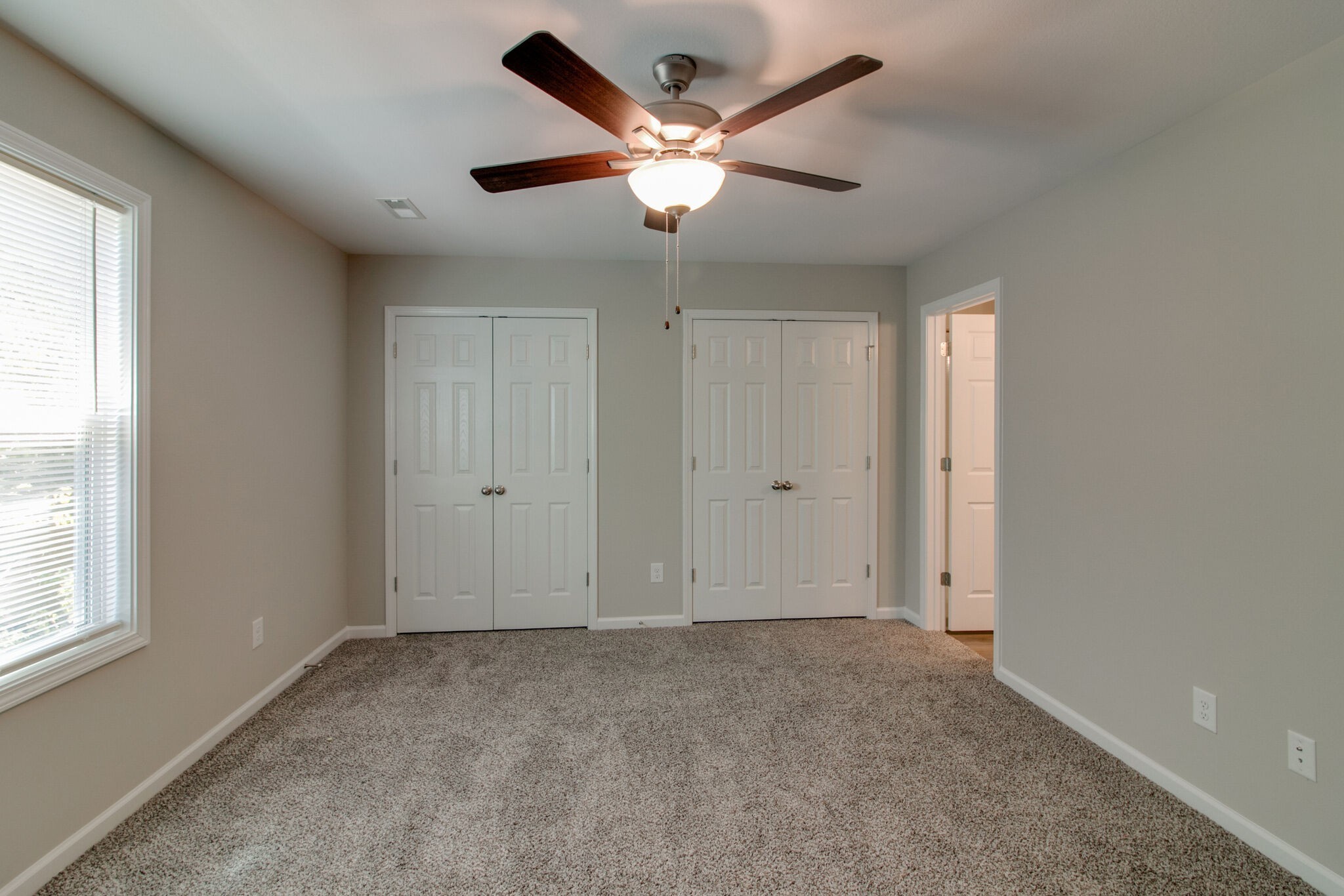 947 Center Road, Unit B Clarksville, TN 37042 - Photo 10 of 24 a view of an empty room with a ceiling fan and window