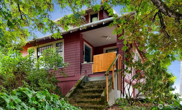 a backyard of a house with lots of green space
