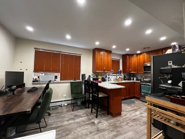a view of a dining room with furniture