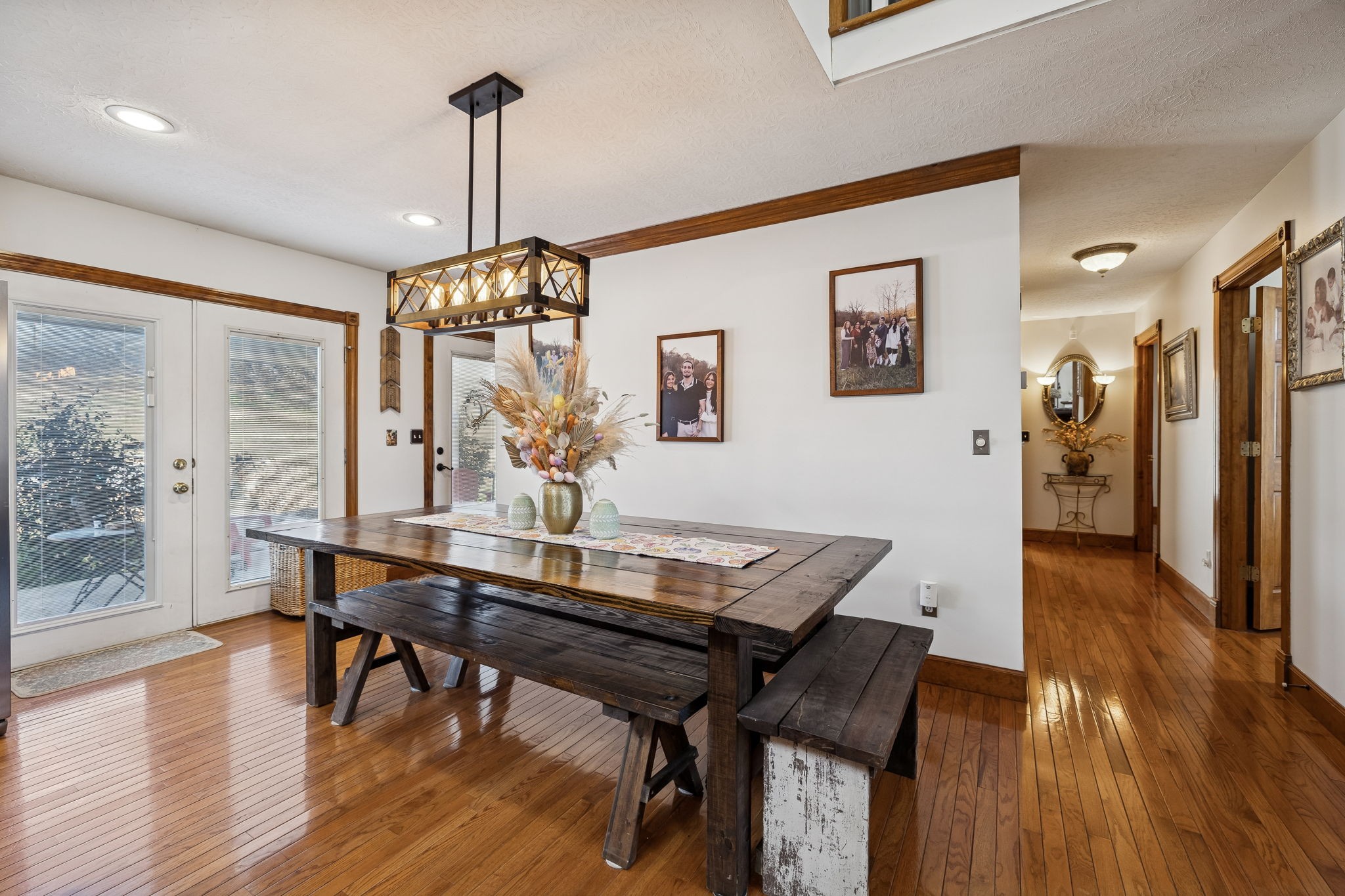 389 Trace Creek Road Red Boiling Springs, TN 37150 - Photo 16 of 57 a view of a dining room with furniture window and wooden floor