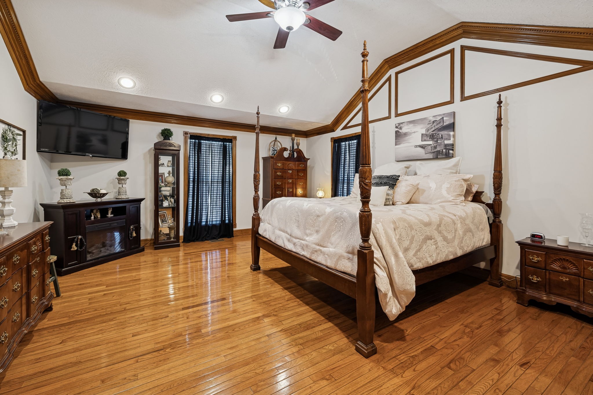 389 Trace Creek Road Red Boiling Springs, TN 37150 - Photo 24 of 57 a bedroom with a bed window and a flat screen tv