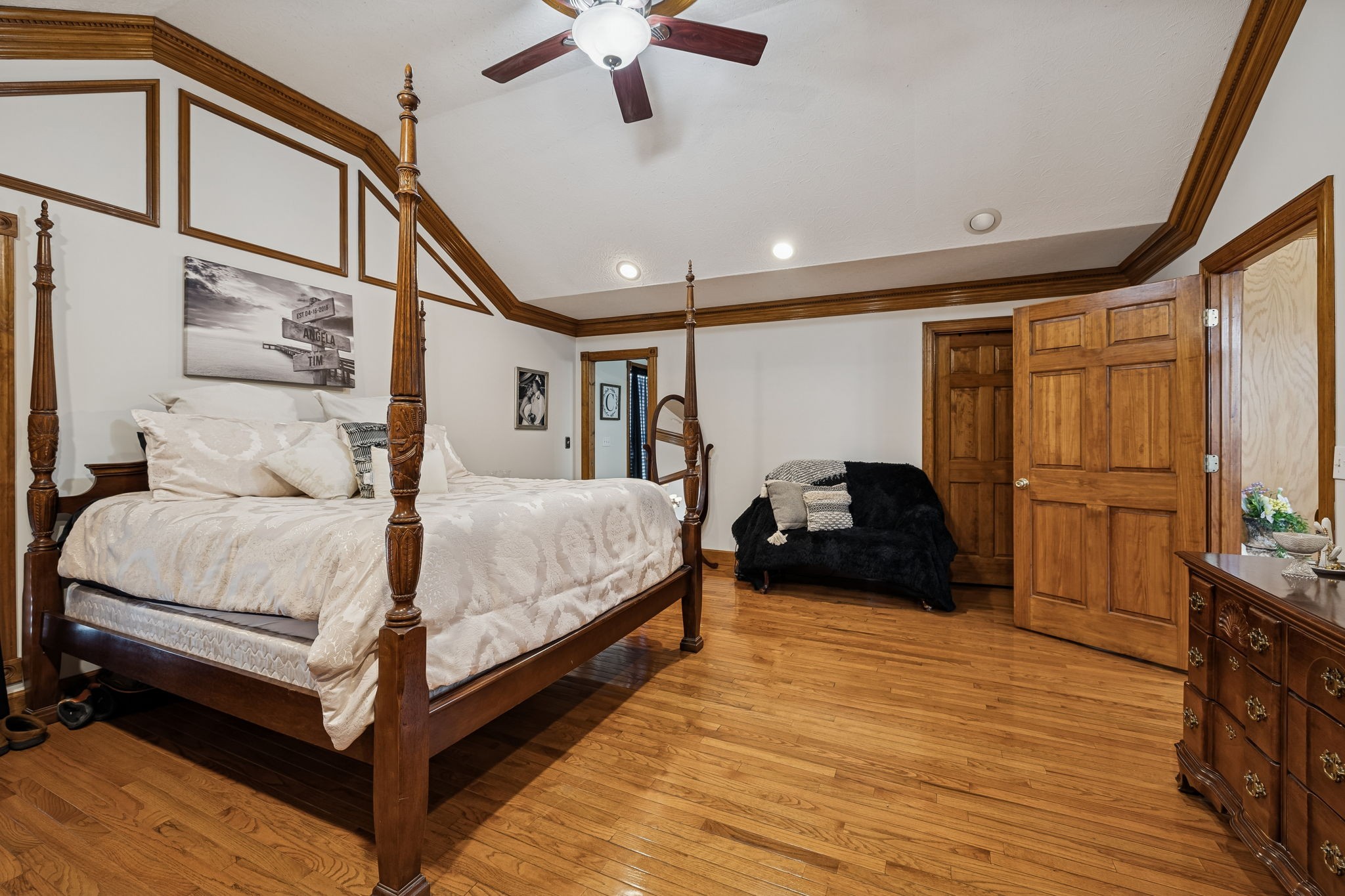 389 Trace Creek Road Red Boiling Springs, TN 37150 - Photo 26 of 57 a bedroom with a bed window and a chandelier