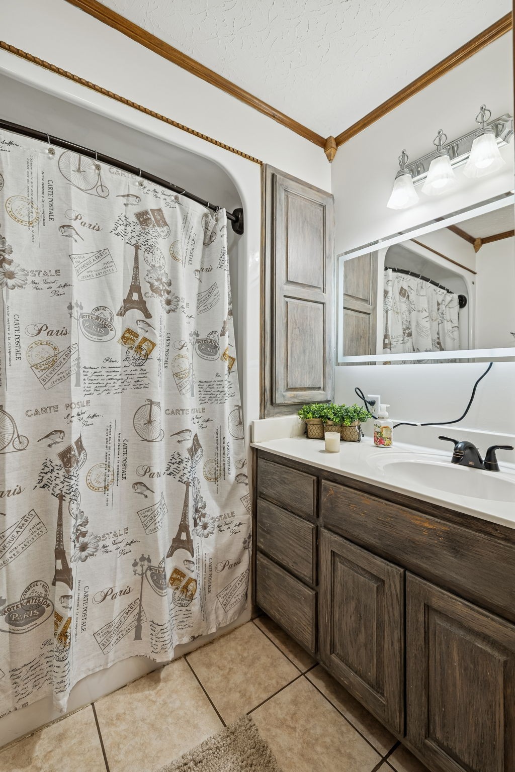 389 Trace Creek Road Red Boiling Springs, TN 37150 - Photo 30 of 57 a bathroom with a double vanity sink and mirror