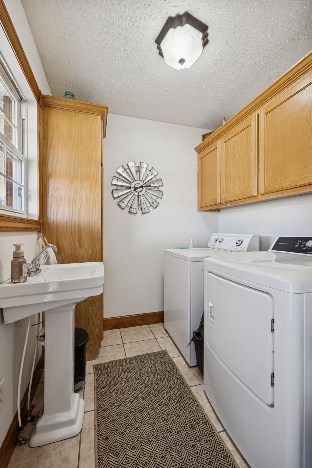 389 Trace Creek Road Red Boiling Springs, TN 37150 - Photo 35 of 57 a view of utility room with washer and dryer