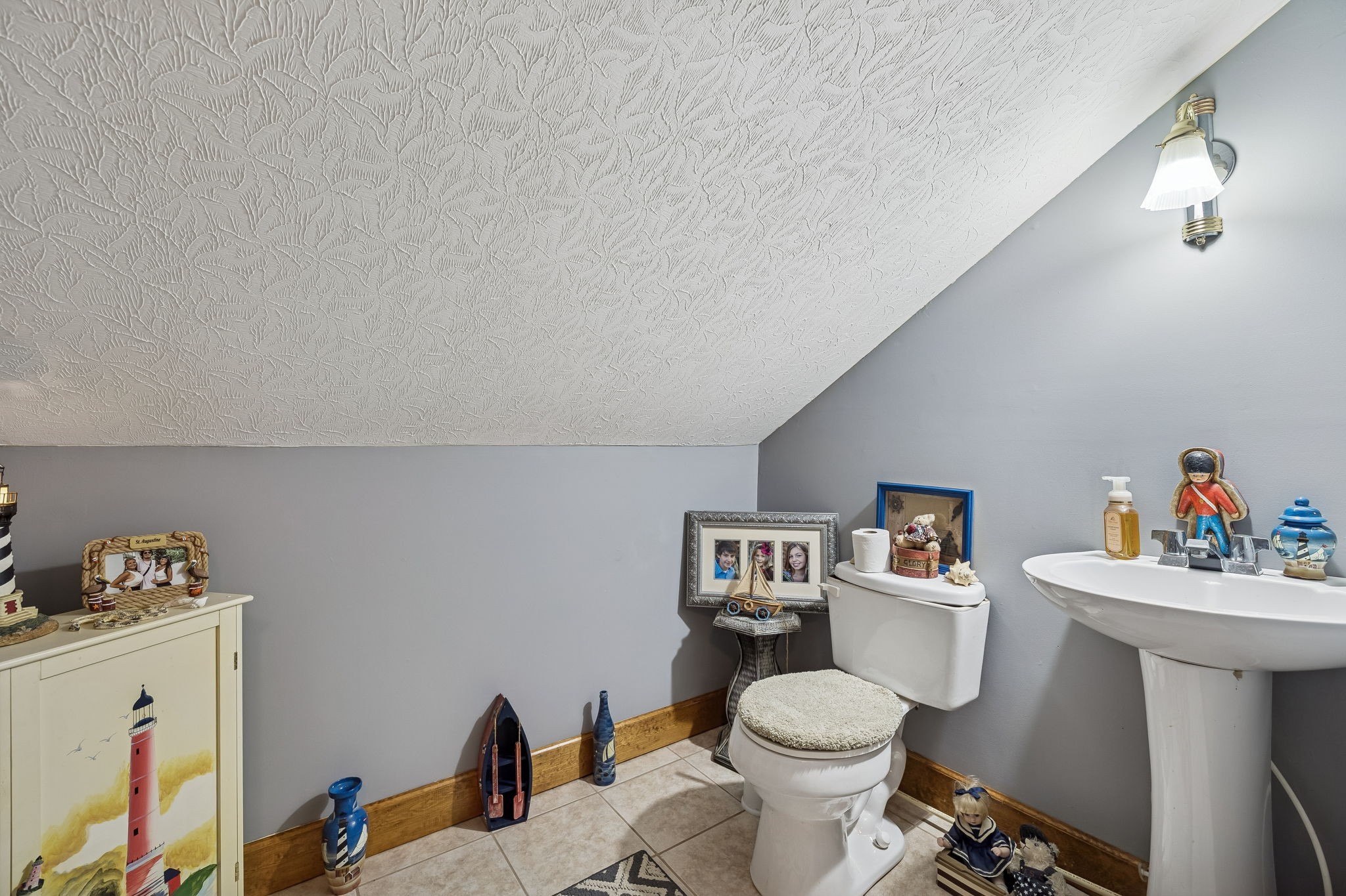 389 Trace Creek Road Red Boiling Springs, TN 37150 - Photo 41 of 57 a bathroom with a toilet sink and mirror