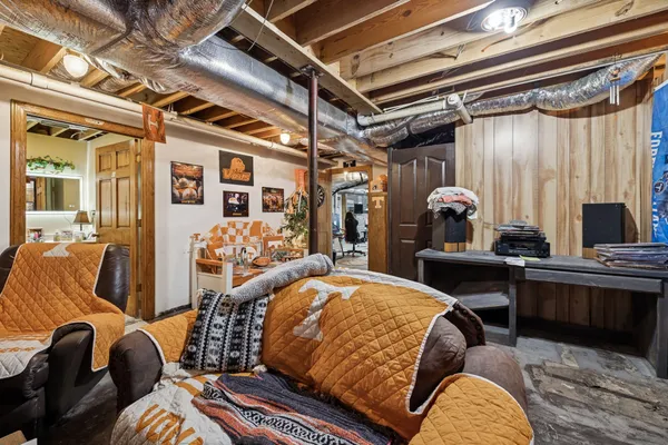 a view of swimming pool with outdoor seating and plants