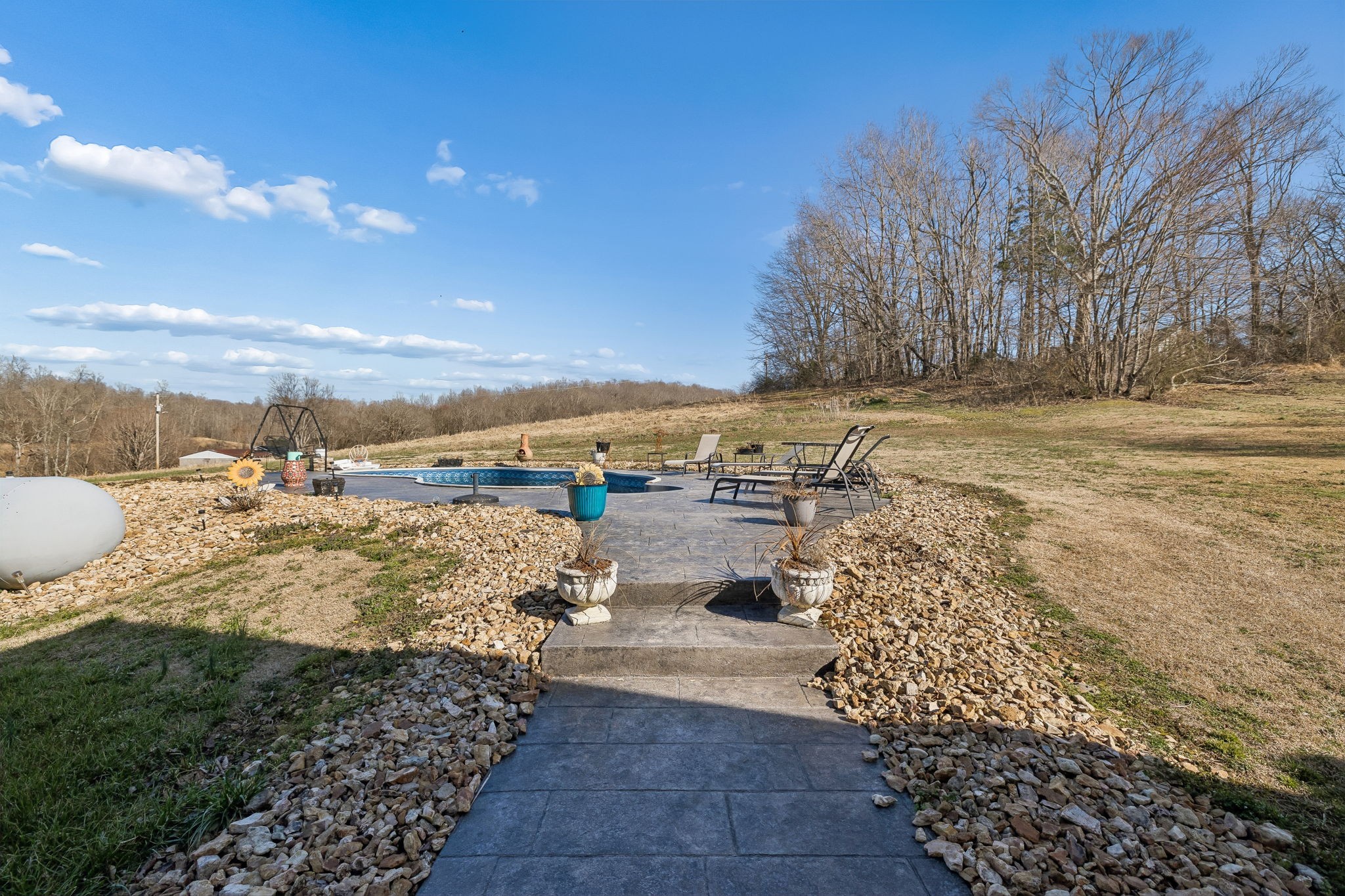 389 Trace Creek Road Red Boiling Springs, TN 37150 - Photo 50 of 57 a view of a yard with an ocean view