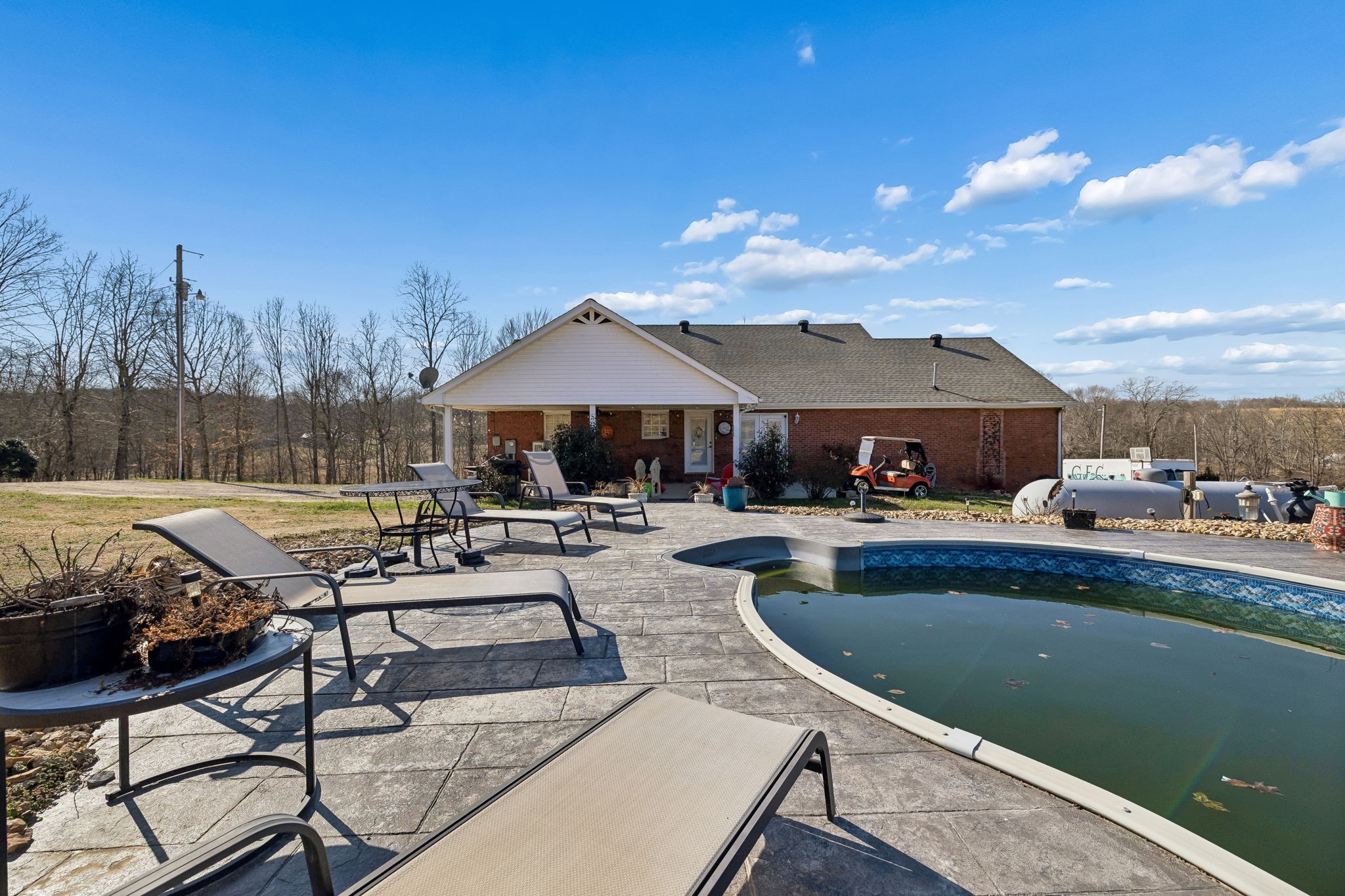389 Trace Creek Road Red Boiling Springs, TN 37150 - Photo 52 of 57 a view of swimming pool with outdoor seating and plants