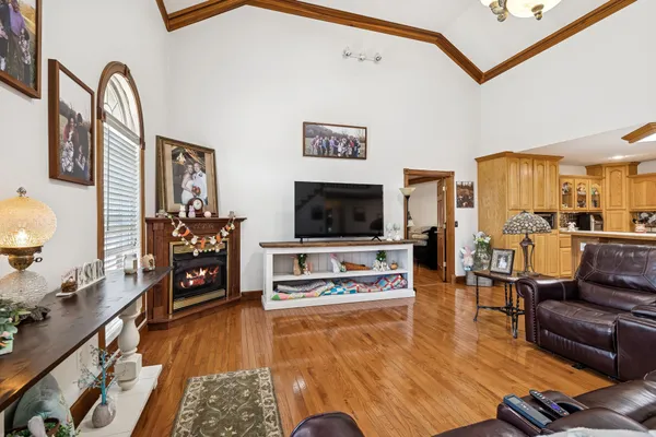 a living room with furniture and a flat screen tv