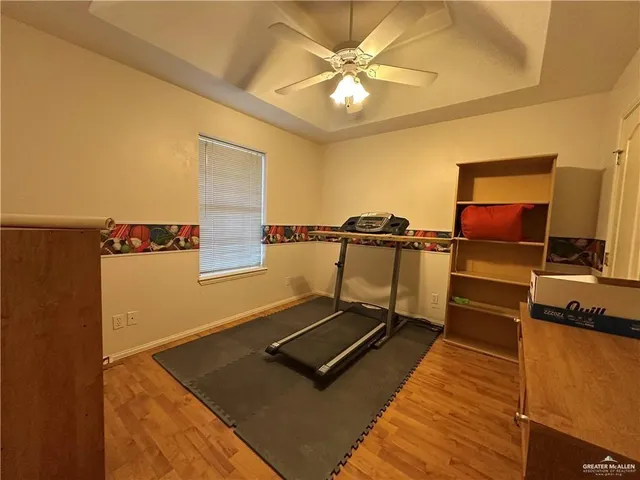 a view of a workspace with furniture