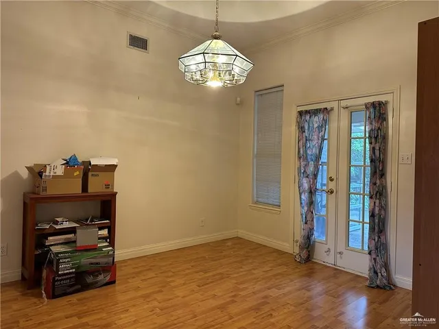 a view of a livingroom with wooden floor