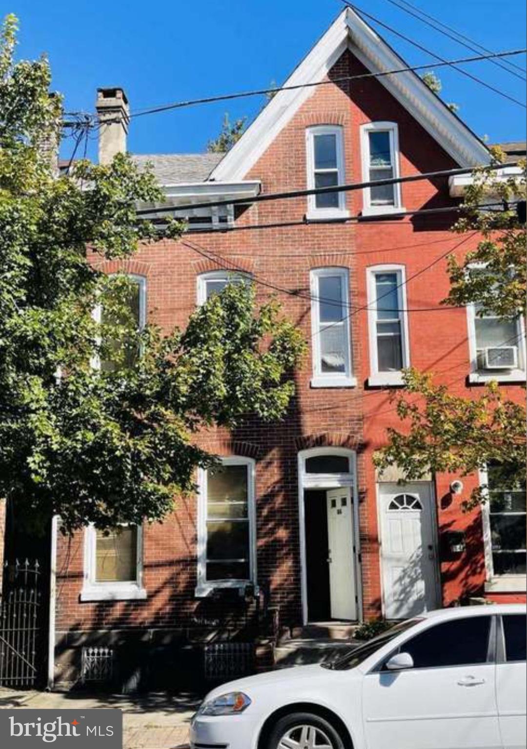 186 West Hanover Street Trenton, NJ 08618 - Photo 1 of 10 front view of a house with a street