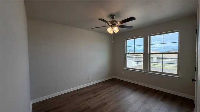 a view of a bathroom from a hallway
