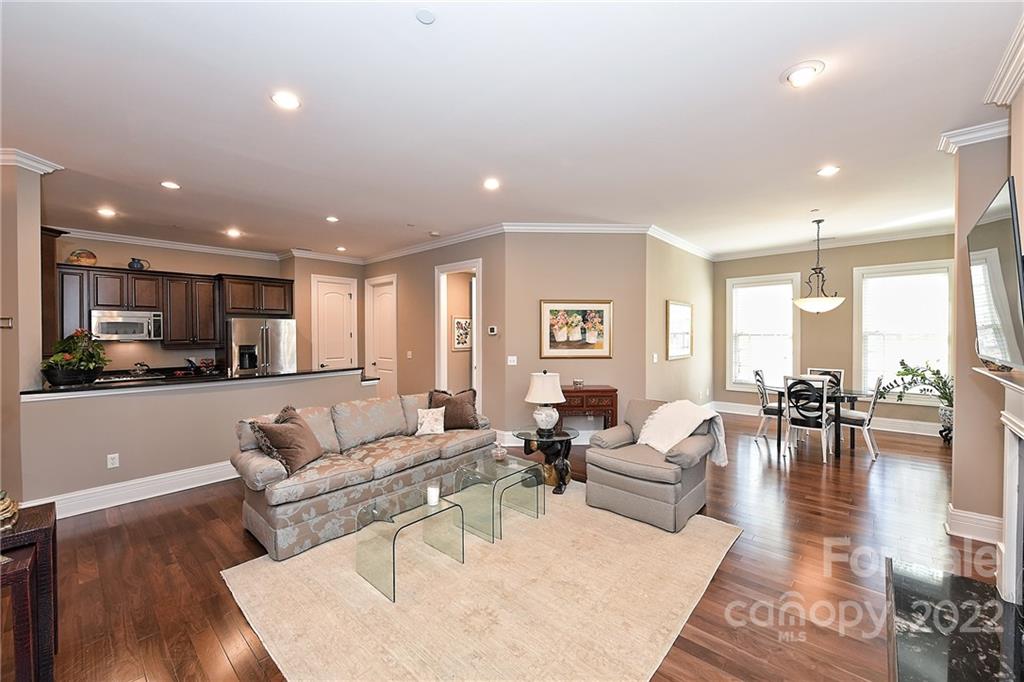 3240 Park Road Charlotte, NC 28209 - Photo 13 of 39 a living room with furniture and a wooden floor