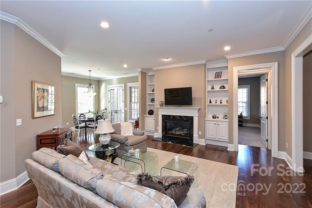 3240 Park Road Charlotte, NC 28209 - Photo 14 of 39 a living room with furniture flat screen tv and fireplace