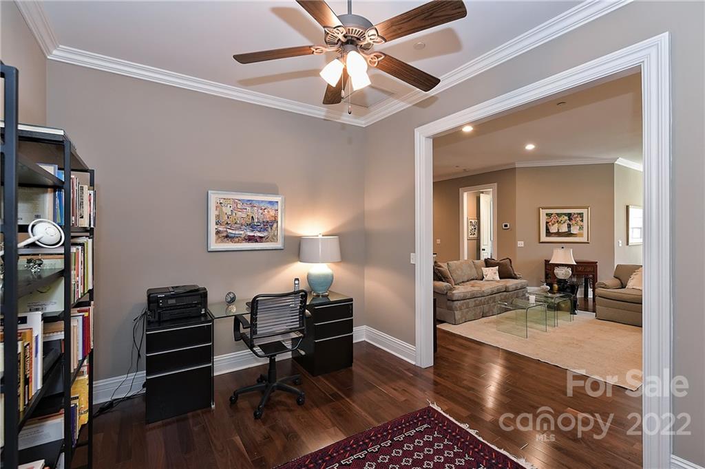 3240 Park Road Charlotte, NC 28209 - Photo 20 of 39 a view of a livingroom with furniture and a flat screen tv