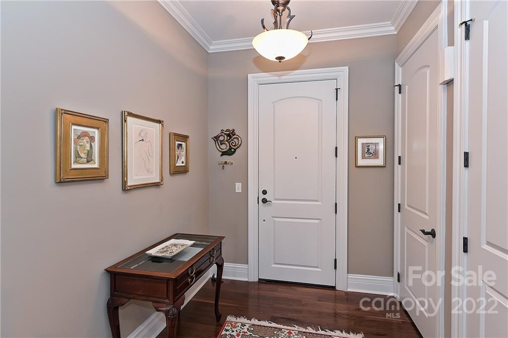 3240 Park Road Charlotte, NC 28209 - Photo 4 of 39 a view of room with workspace and wooden floor