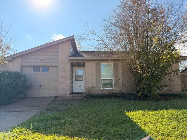 a view of a house with a garden