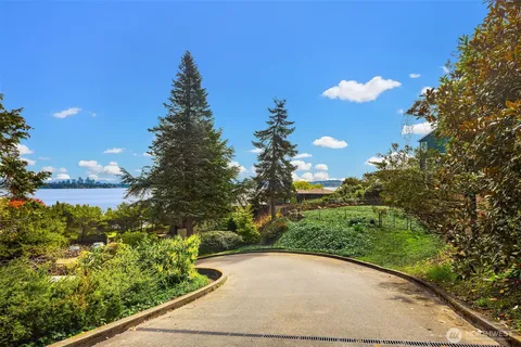 a view of a backyard of the house