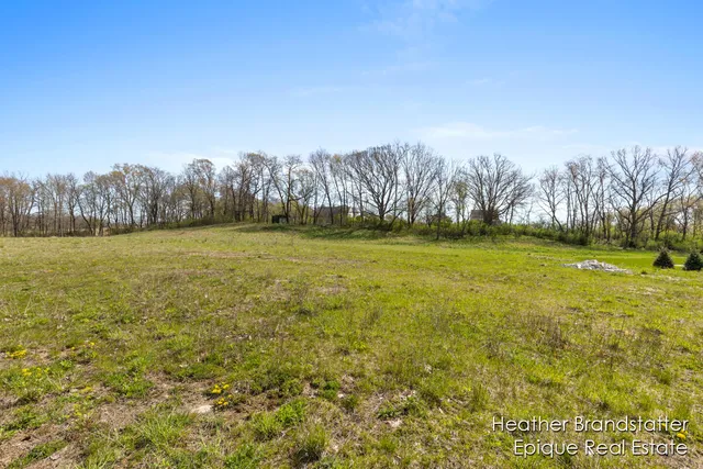 $299,000 | 5000 Hickory Pointe Wds Southeast, Ada, MI 49301