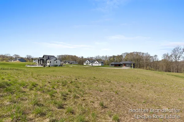 $324,000 | 5000 Hickory Pointe Wds Southeast, Ada, MI 49301