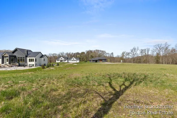 $324,000 | 5000 Hickory Pointe Wds Southeast, Ada, MI 49301