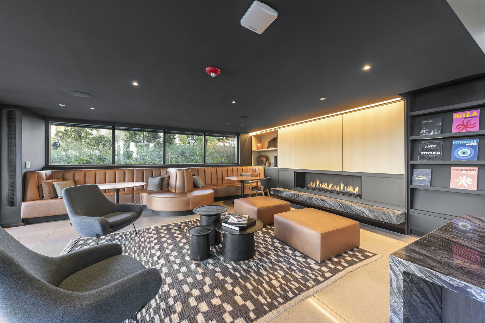 234 West Polk Street, Unit 2610 Chicago, IL 60605 - Photo 18 of 36 a living room with furniture a rug and a projector