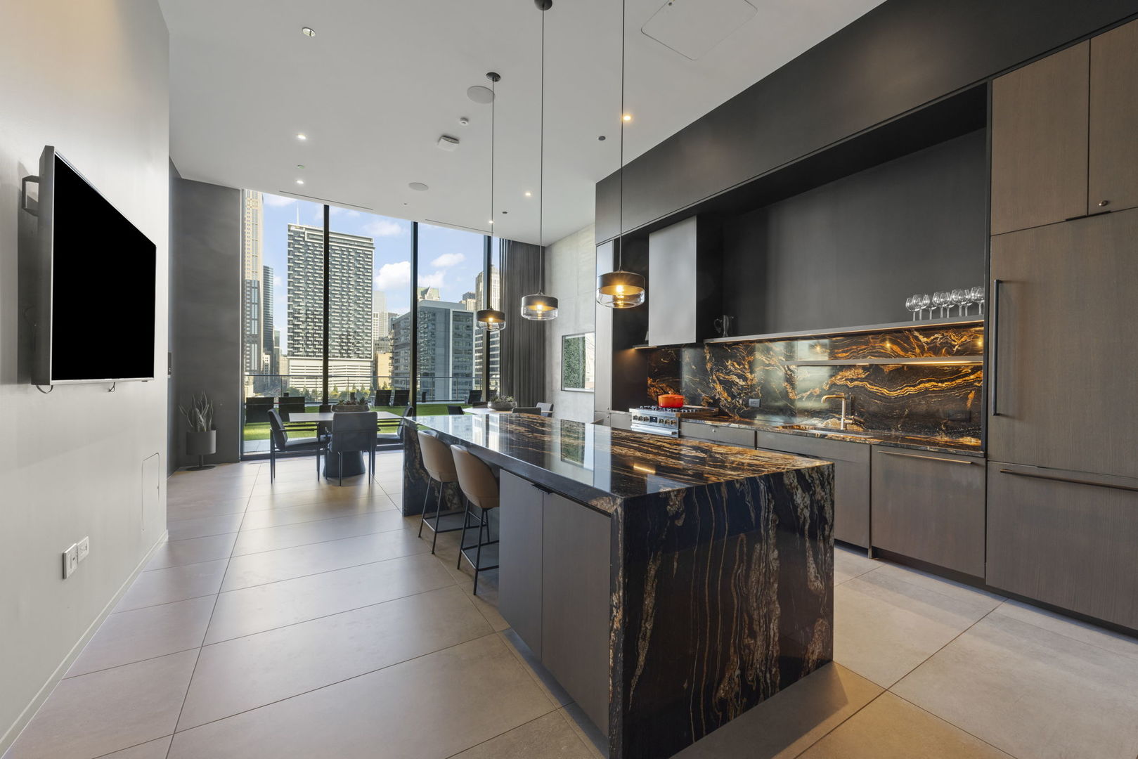 234 West Polk Street, Unit 2610 Chicago, IL 60605 - Photo 25 of 36 a kitchen with kitchen island granite countertop lots of counter top space