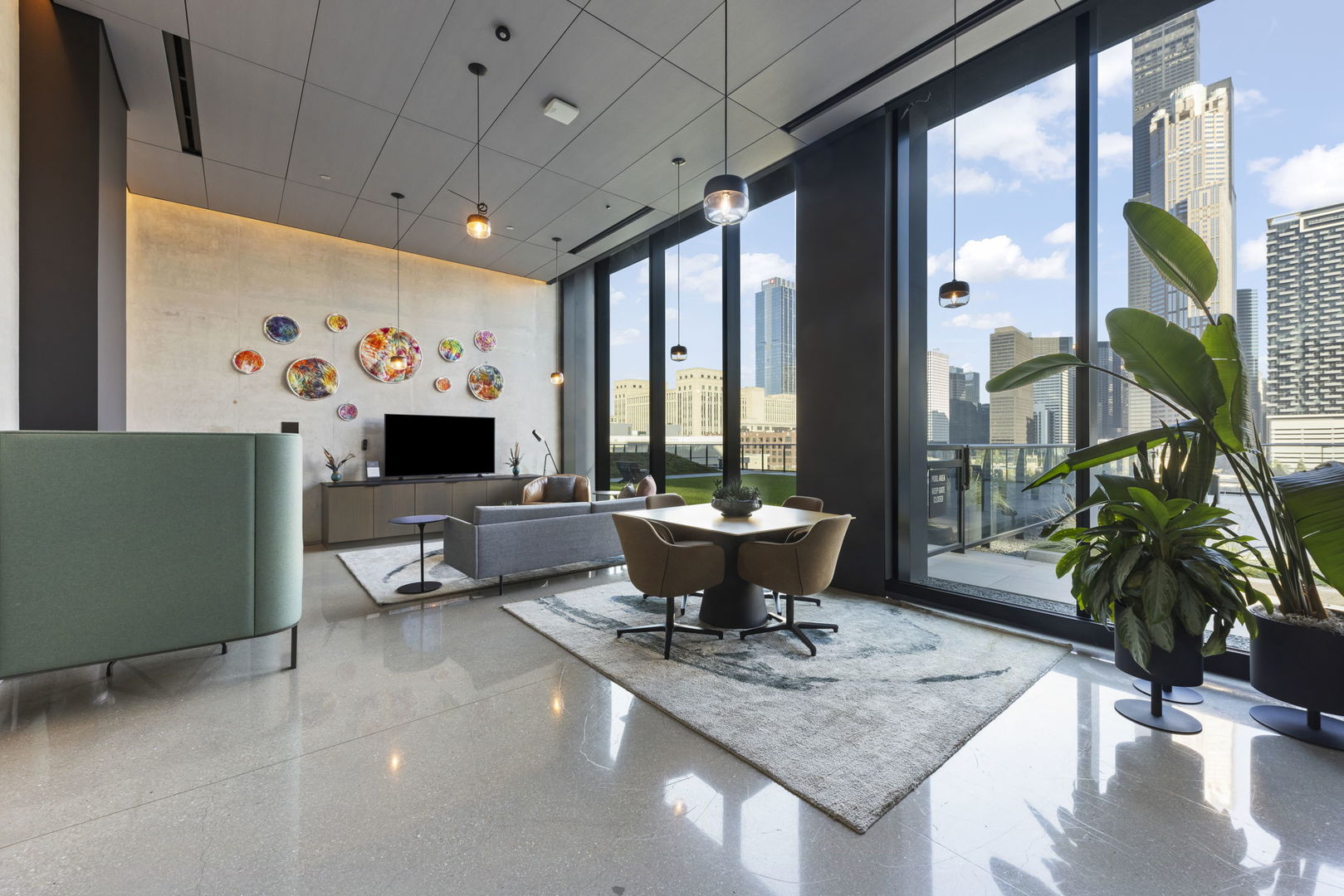 234 West Polk Street, Unit 2610 Chicago, IL 60605 - Photo 27 of 36 a living room with furniture a dining table and a potted plant