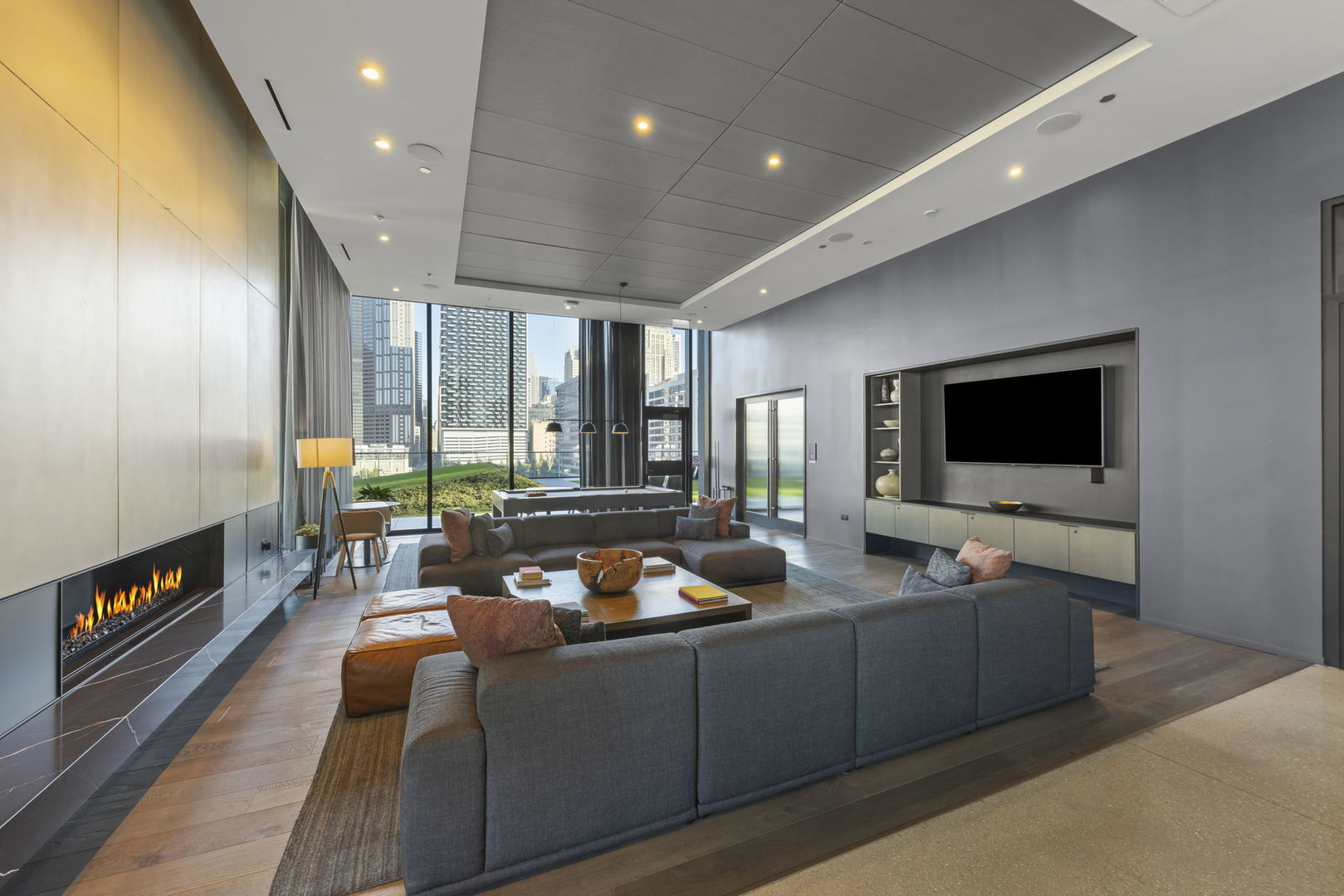 234 West Polk Street, Unit 2610 Chicago, IL 60605 - Photo 28 of 36 a living room with furniture and a flat screen tv