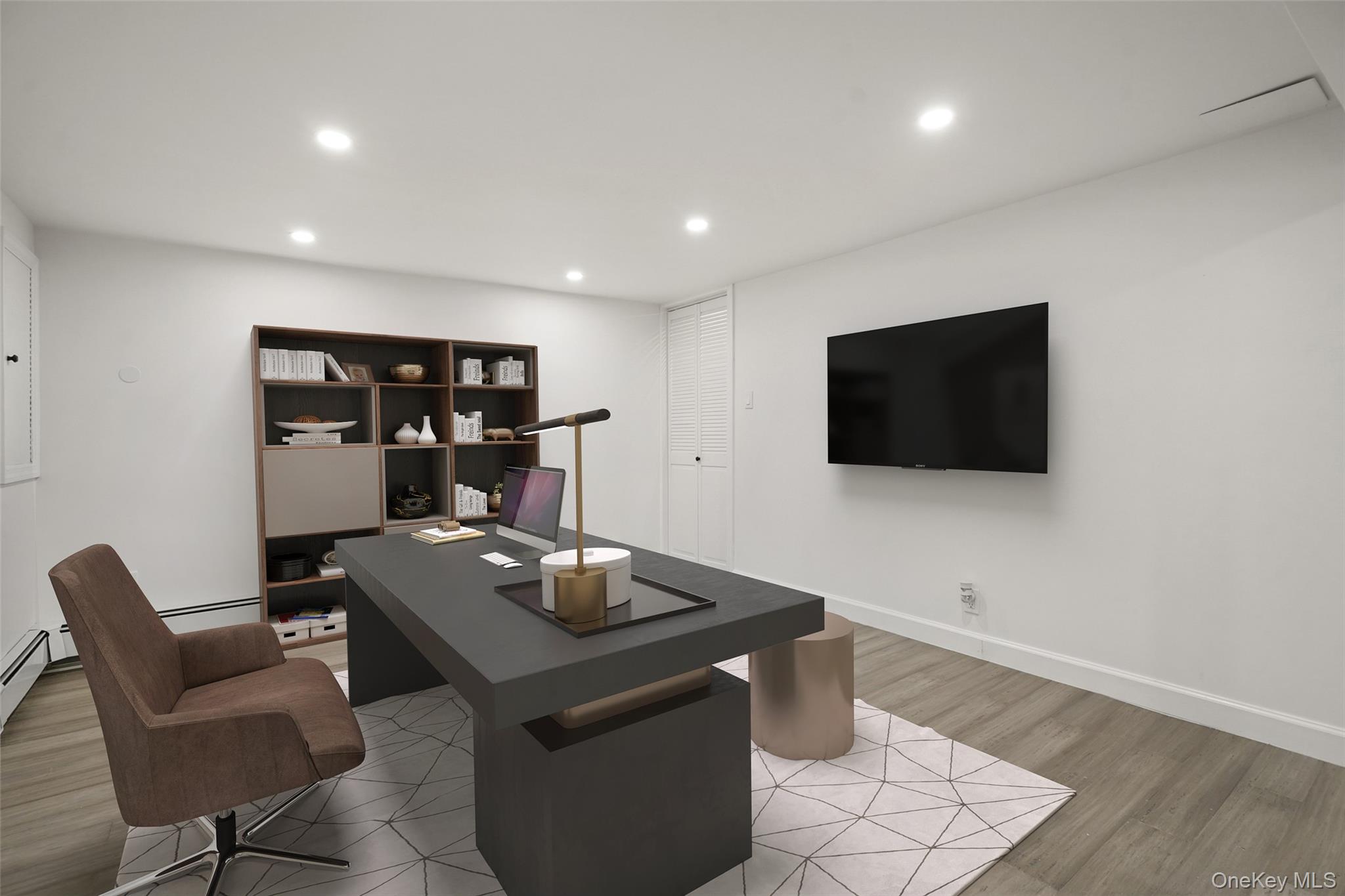 59 Hoags Cross Road Ossining, NY 10562 - Photo 19 of 25 a living room with a flat screen tv and kitchen view